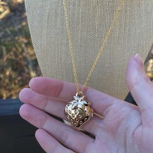 Gold strawberry locket necklace
